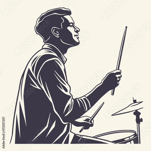 A stylish drummer in profile holding drumsticks poised to play