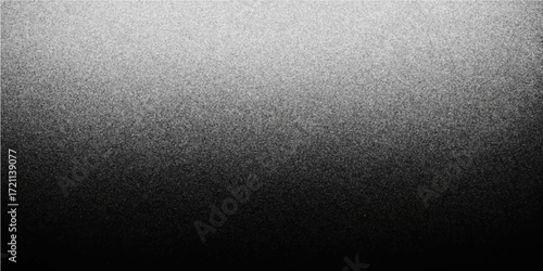 Brushed metallic texture pattern with a dark, textured gradient of gray and silver