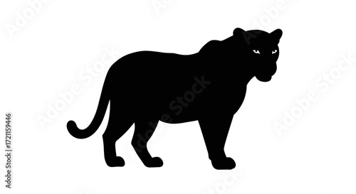 Silhouette of a majestic black panther standing powerfully alert with glowing eyes and flowing tail