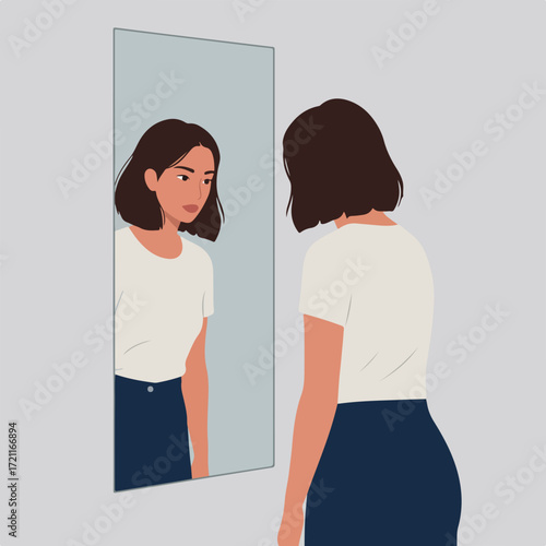 Woman gazes at herself in a mirror, expressing sadness or self-doubt
