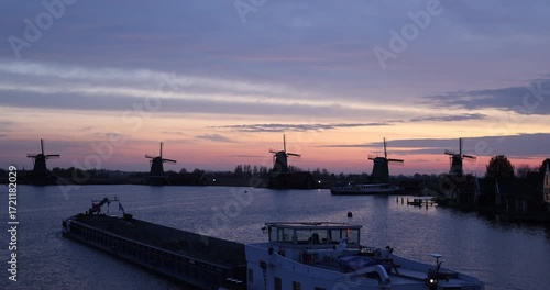 Sunrise over Traditional Windmills in Zaanse Schans, Netherlands