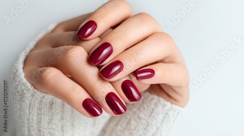 Glamorous red manicure art beauty salon hand model close-up glossy red nails fashion nails environment