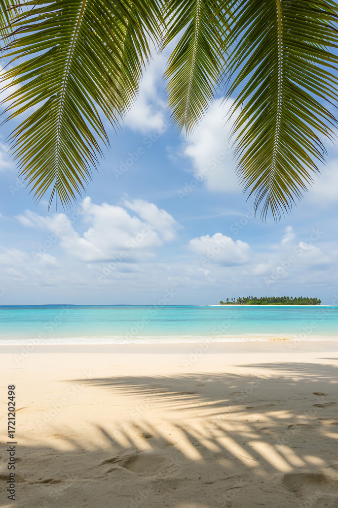 Obraz premium Tropical beach paradise with palm leaves framing a clear blue ocean
