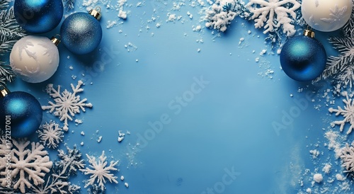 Blue and White Christmas Decorations With Snowflakes on a Festive Background