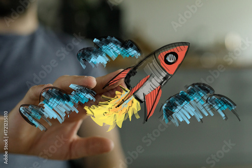 Image of a hand holding a r...