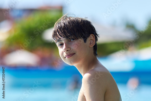 Wallpaper Mural Boy enjoys summer at water park by the sea Torontodigital.ca