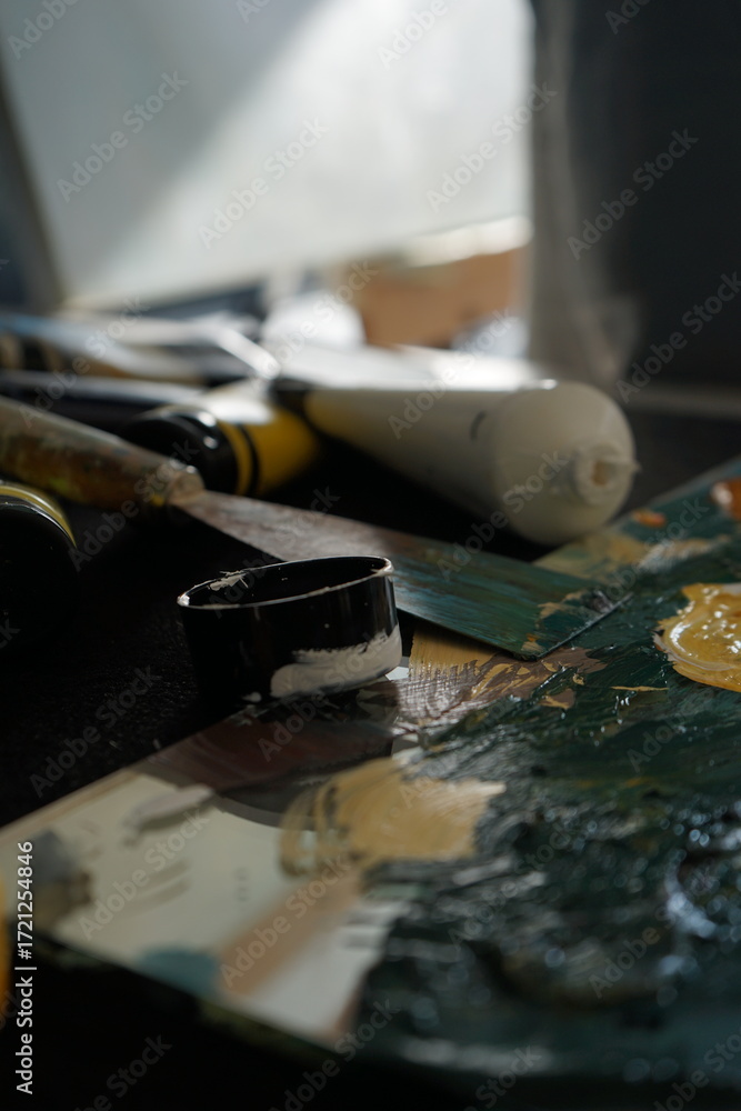 Fototapeta premium Painting on Canvas in Studio