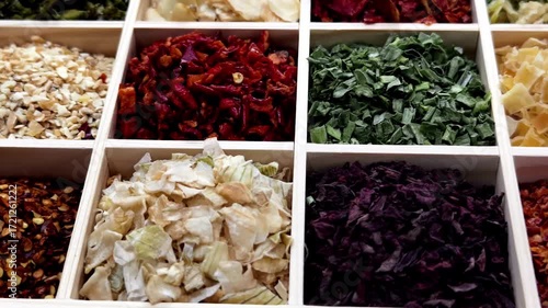 Explore vibrant herbs and spices in colorful display at local market in autumn