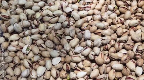 Pistachios in their shells show vibrant colors and unique textures at a local market