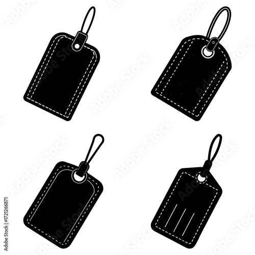 Four black luggage tags with different designs and looped straps on a white background are displayed