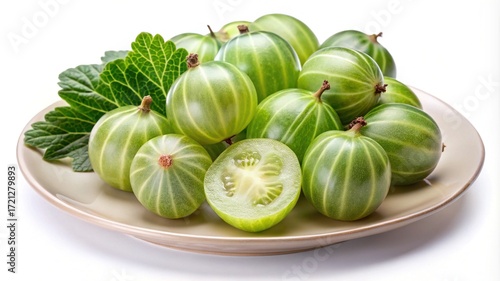 Wallpaper Mural Fresh ripe gooseberries on a plate, with one cut in half to show interior Torontodigital.ca