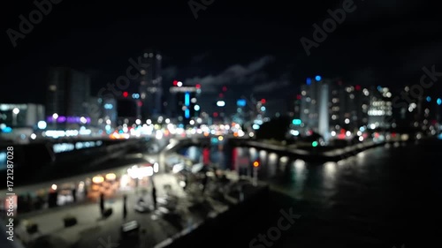 Wallpaper Mural Blurred night view of Rotterdam waterfront with vibrant city lights reflecting Torontodigital.ca