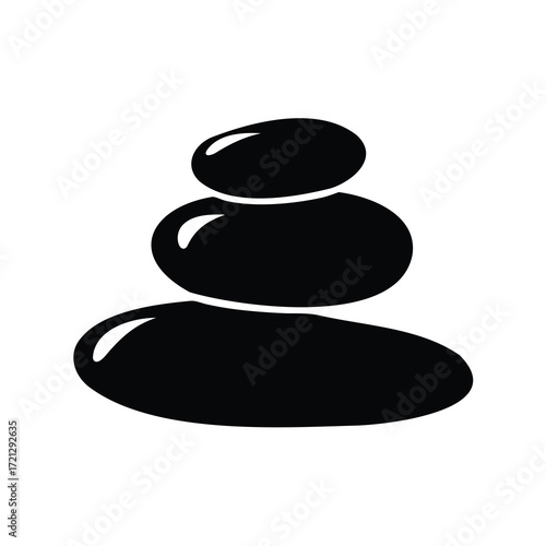Minimalist zen stones tower, smooth black pebbles stacked on white background
