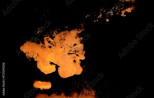 Orange colorful fluorescent smoke on black background,Art abstract smoke texture,Colored liquid dye,Splash paint,Abstract color,Abstract Textures	

