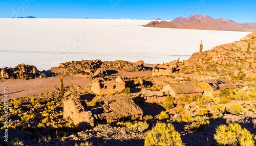 Abandoned village nestled in Andean highlands, overlooking a vast salt flat