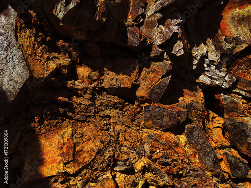 Autumn trend Burnt Wood. Burnt Wood color. Autumn style. Rock texture. Geodesy and geology. Burnt Wood tinted minerals.