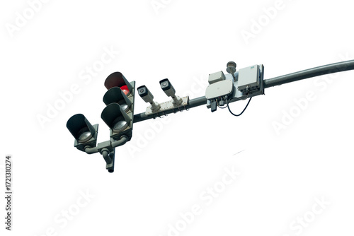A traffic light with a camera on it