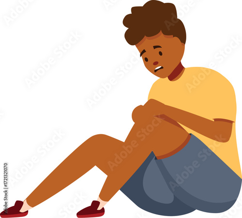 Sad boy holding his painful knee, suffering from arthritis, trauma or injury, healthcare and medical concept