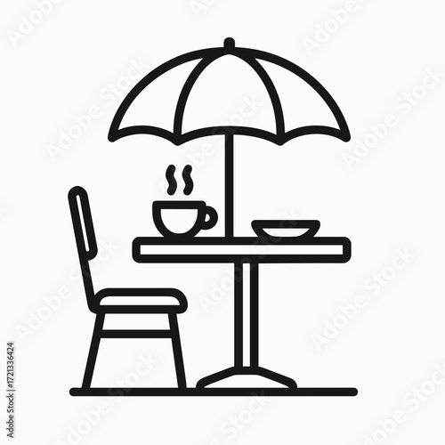 Outdoor café table with umbrella and coffee cup 