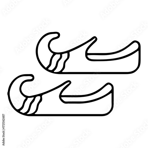 Pair of elf shoes isolated on white background