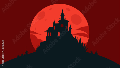 Silhouette of a spooky haunted house on a hill with a large red moon in the crimson sky background