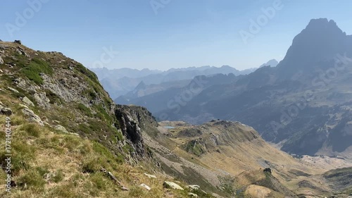 Hikers contemplate the landscape in the Pyrenees