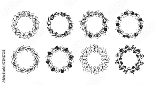Collection of eight detailed oval floral and leaf wreaths in a black silhouette