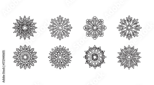 Collection of eight intricate black and white mandala like ornate decorative elements silhouette