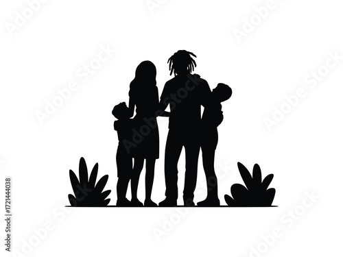 Silhouette of a family with two children in a natural setting
