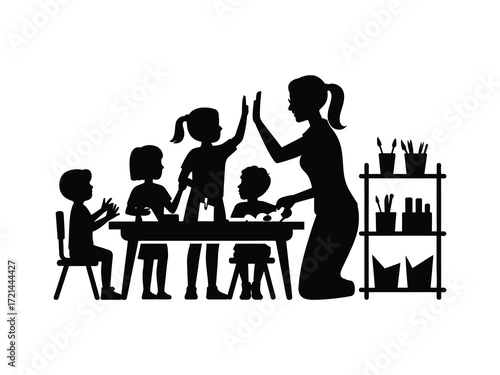 Teacher and students celebrating success in the classroom
