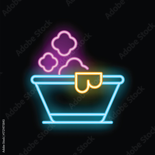 Neon bathtub with towel hanging on side and steam coming up, concept for relaxation, spa, bathroom