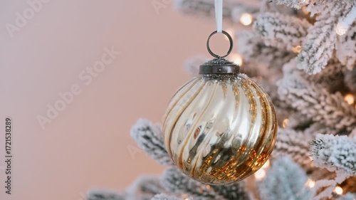 Christmas ornament hanging frosted pine branch, glowing fairy lights bokeh, holiday celebration scene, traditional festive decoration, New Year tree sparkle, cozy winter atmosphere, seasonal joyful