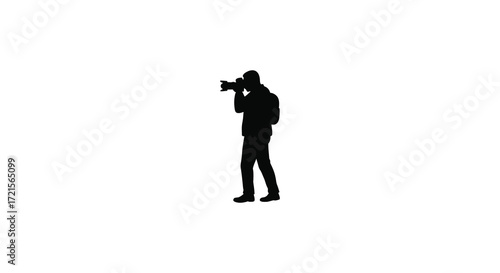 Silhouette of a photographer capturing a moment with a camera
