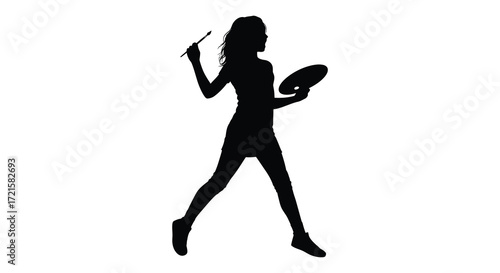 Silhouette of a woman walking with a paintbrush and paint palette