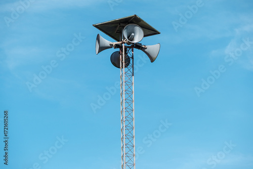 Public Loudspeaker Tower Outdoors with Blue Sky