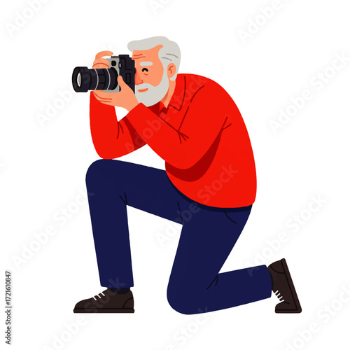 Elderly man with white beard kneeling and taking a photograph with a professional camera.