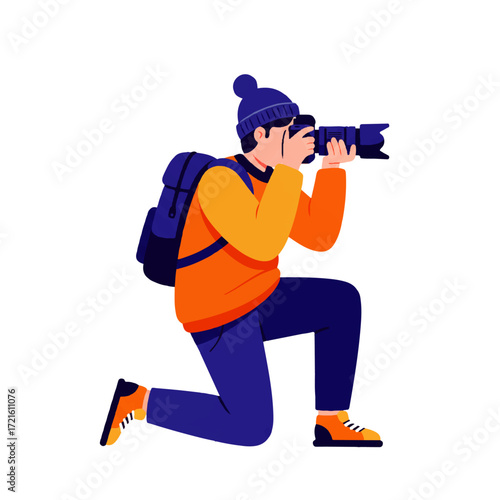 A photographer kneels, holding a camera with a large lens, wearing a hat, backpack, and orange sweater against a white background.