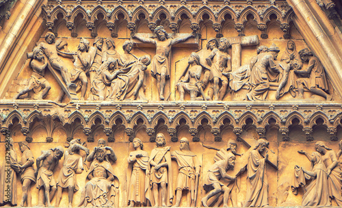 Intricate Medieval Bas-Relief Depicting Religious Scenes on Fasade Cologne Cathedral