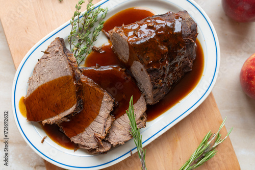 Delicious homemade roasted beef with sauce
