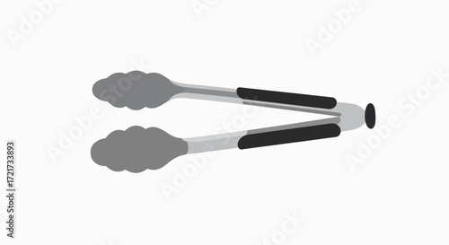 Close-up shot of a pair of metal tongs, used for cooking and grilling.