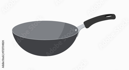 Gray wok pan with a black handle, side view.