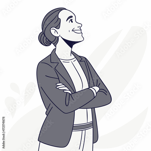 Confident woman in a blazer standing with arms crossed looking up and smiling with a bun hairstyle present