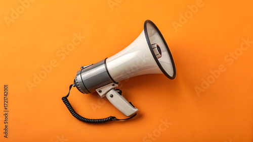 White megaphone on orange background
