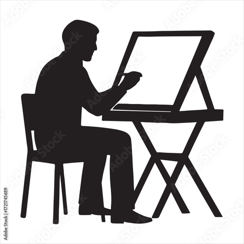 silhouette of a man working on a laptop