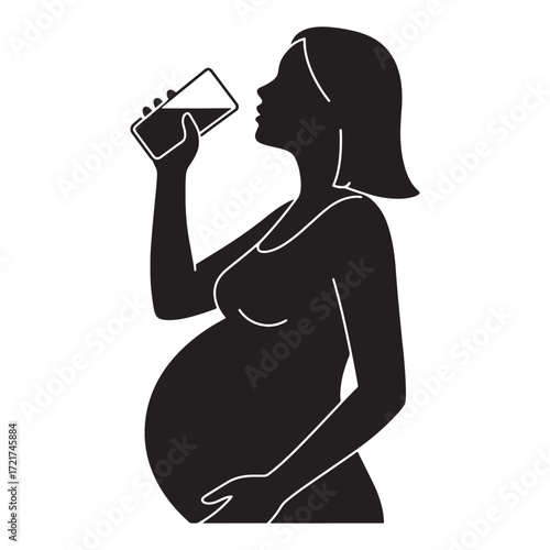 Silhouette of a pregnant woman drinking from a glass