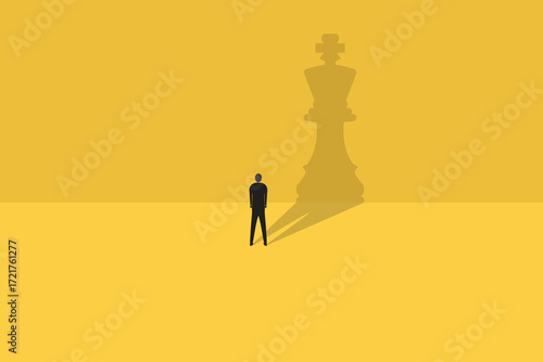 Businessman turned into or shadow of king chess. concept of business success, leadership, and target