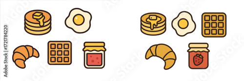Delicious breakfast items featuring pancakes, eggs, croissants, and jam made for a satisfying morning meal