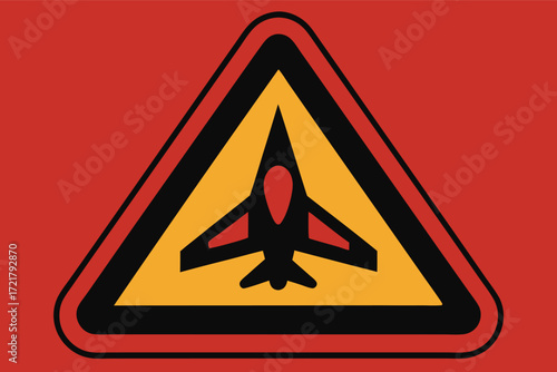 Warning sign indicating aircraft activity in a restricted area for safety awareness