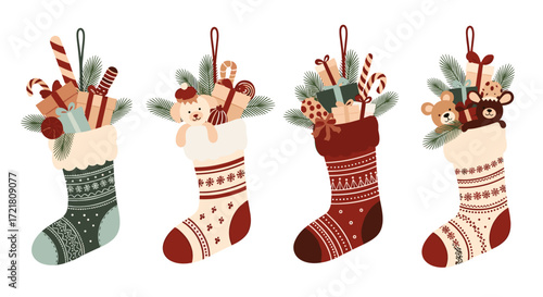 Four festive christmas stockings overflowing with gifts candy and ornaments
