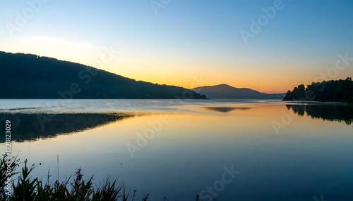 Wallpaper Mural Serene lake sunrise reflecting mountains Torontodigital.ca